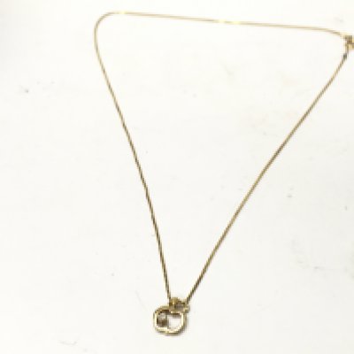 A 14ct gold necklace with 14ct pendant with a small diamond stone , 2.7g total weight. Postage category A