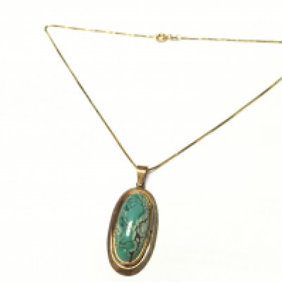 A 14ct gold necklace with a polished stone pendant in a 14ct gold mount , 9.6g total weight . Postage category A