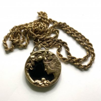 A 9ct gold rope chain together with a 9ct gold hallmarked art Noveau style pendant. (Overall weight 29.6g). A.