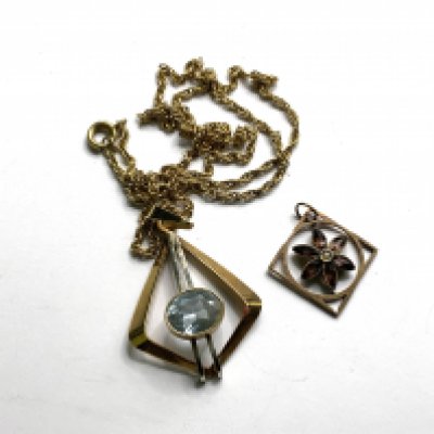 2 9ct gold stone set pendants one with a 9ct gold rope chain.