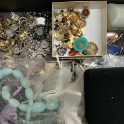 A large selection of costume jewellery etc to include faux pearls, silver jewellery etc.