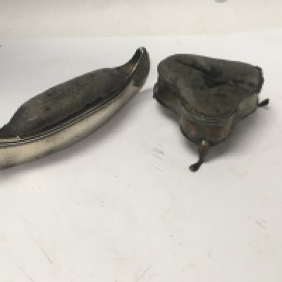 Two Small silver pin cushions.