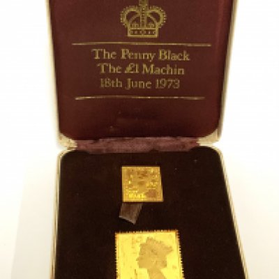 The penny Black & The &pound;1 Machin 22ct gold replica stamps, 19th June 1973. (12.39g, 25.39g). (A)