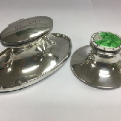 Two silver inkwells, one with enamel decoration, sadly damaged. Shipping category B.
