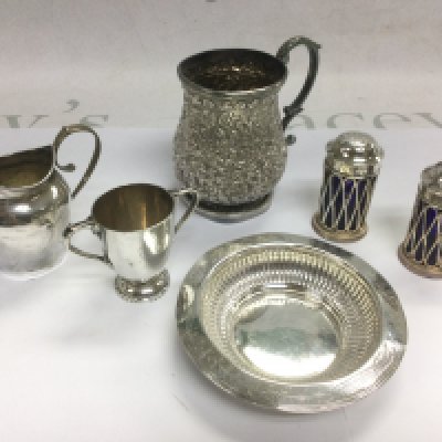WITHDRAWN - A collection of silver items comprising cruets, jug, an Indian tankard etc. Shipping category B.