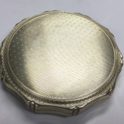 A solid silver Kigu powder compact. Shipping category A.