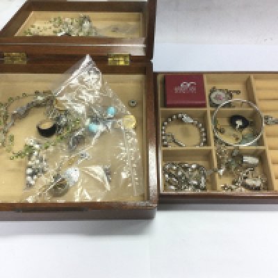 A jewellery box comprising mainly silver jewellery items. Shipping category D.