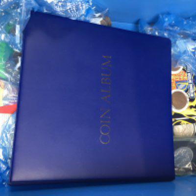 A collection of mixed British coins and banknotes . Postage category C