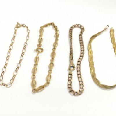 Four 9ct gold bracelets of various designs. 10.84g Postage A