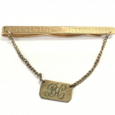 A 9ct gold tie clip. 8.59gPostage A