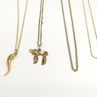 Four 9ct gold chain two with pendants. 9.97g total. Postage A