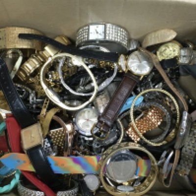 A box of various watches including Rotary and Seiko. Postage category b