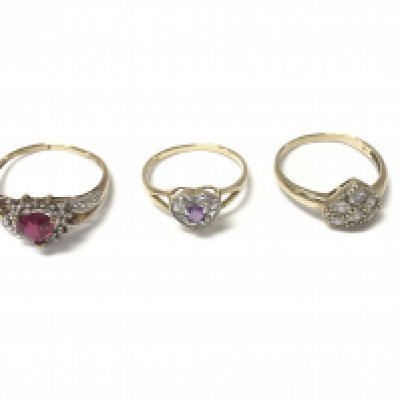 Three 9ct gold rings set with assorted gems.total weight 5.79g. Postage A