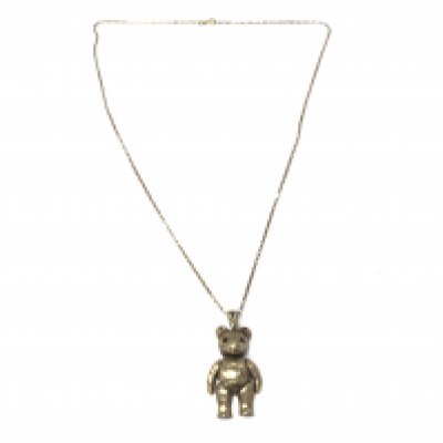 A 9ct gold teddy pendant with a 9ct gold chain. 8.35g Postage A