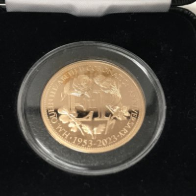 A 2023 gold half ounce coin. Proof finish and first strike with COA. Postage B