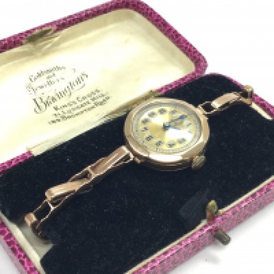A ladies 9ct gold watch. 17g Postage category A