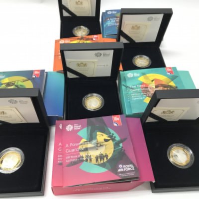 A collection of 5 royal mint RAF silver proof piedfort coins. Postage B
