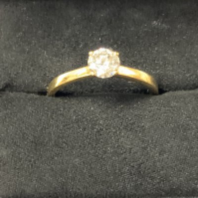A 77 diamond solitaire ring with box. The diamond with GIA certificate. 0.63 of carat, colour J VS2, ring size approximately Q. Postage category A.