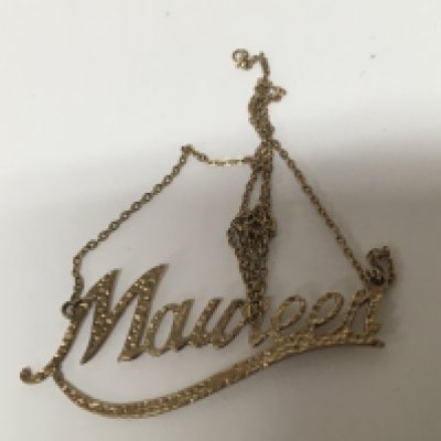 A 9carat gold Maureen pendent with attached chain. Weight 5g