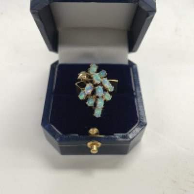 A 14ct gold Opal and diamond. Approx weight