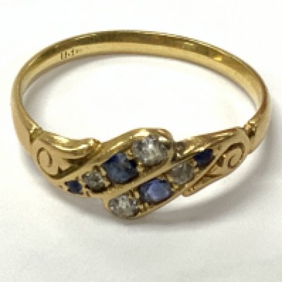 18ct sapphire and diamond ring. Approximately size Q. Postage category A.