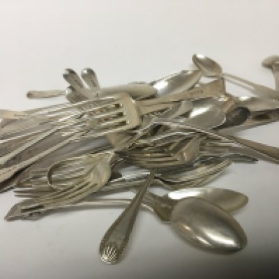 A Collection of silver cutlery including George III cutlery and other later mixed dates and makers total weight approximately 1.3kg.