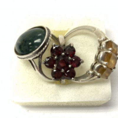 Three sterling silver rings. Postage category A.