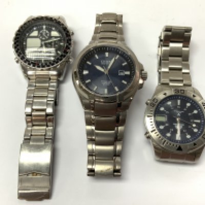 Three dress watches. Postage category B.