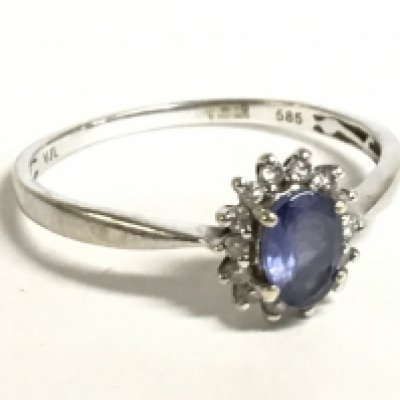A 9 carat ring set with an aquamarine stone and small diamonds, size U. 2.2g. Postage category A
