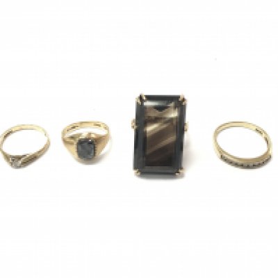 A collection of four 9ct gold rings set with various stones. 13.10g total. Postage B