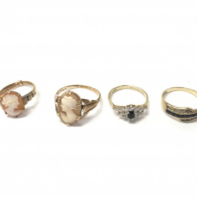 Four 9ct gold rings including two cameo set ones. Postage B