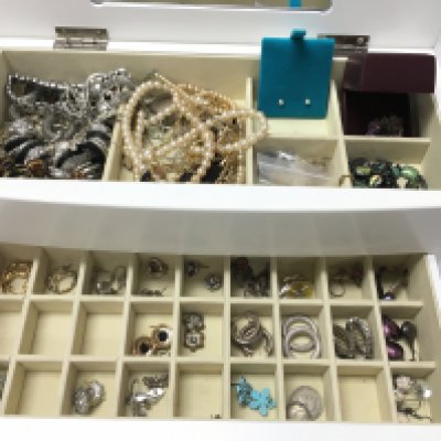 A collection of costume jewellery including silver and amber items. Postage B