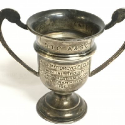 Silver hallmarked car & motorcycle annual best rally driver trophy 1953, a Penny farthing cup dated 1889. 7cm tall. Postage category A