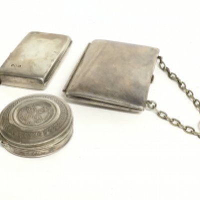 A silver hallmarked sovereign case, a silver plate case with chain, silver hallmarked small trinket box. Postage category B