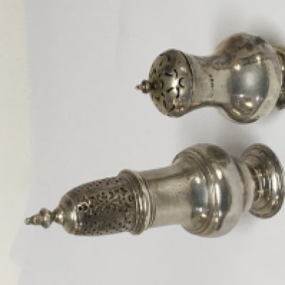 A George III silver sugar caster. Height 13cm and a Victorian condiment (2)