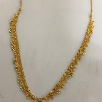 An Indian high grade gold 22 carat necklace with ornate drops. Weight 19g