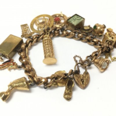 A 9ct gold heavy charm bracelet, approx weight 46.87 grams.