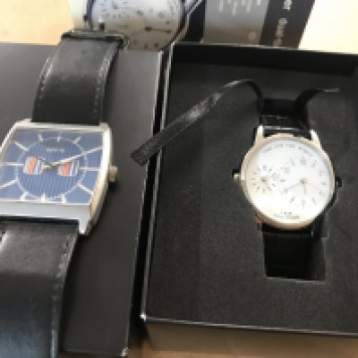 Two modern dress watches