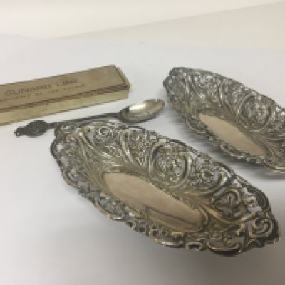 A pairvof silver dishes and a silver Cunard Aquitaina souvenir spoon (3)