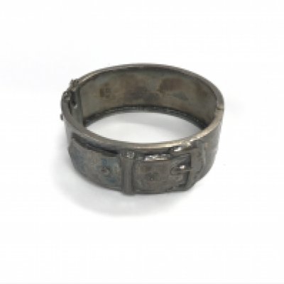 A silver buckle bangle approx weight 36.98grams.