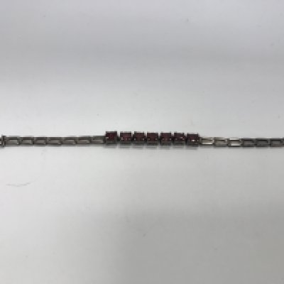 A silver garnet set bracelet. Approx weight 14.37grams.