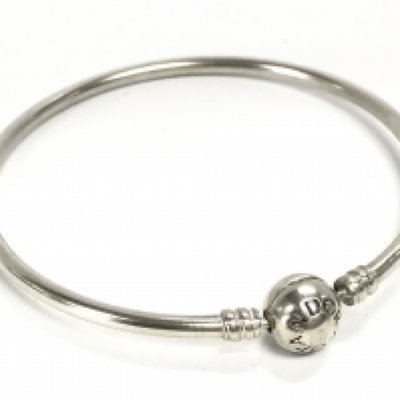A silver Pandora bracelet . Postage category A