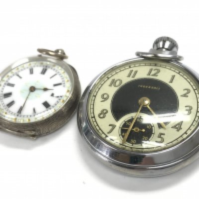 Two pocket watches, one silver. This lot cannot be posted