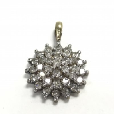 A 9ct gold diamond cluster pendant. Postage category A