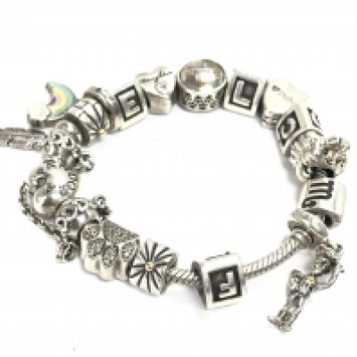 A silver Pandora bracelet with charms. Postage category A