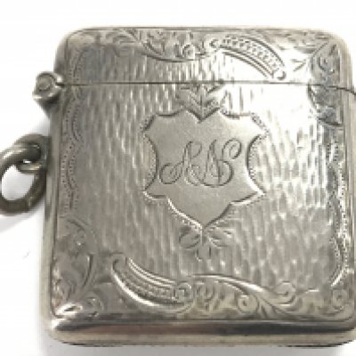 A hallmarked silver vesta case. Postage category A
