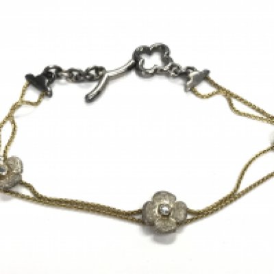 An unusual silver links of London bracelet. Postage category a