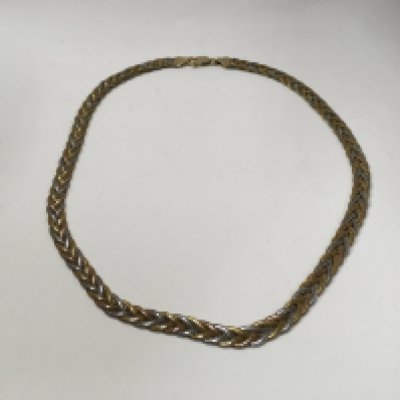 A three coloured 14ct gold necklace. Approx weight 19.3 grams.