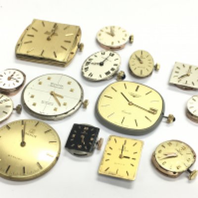 A collection of watch movements including several Omega. Postage category B
