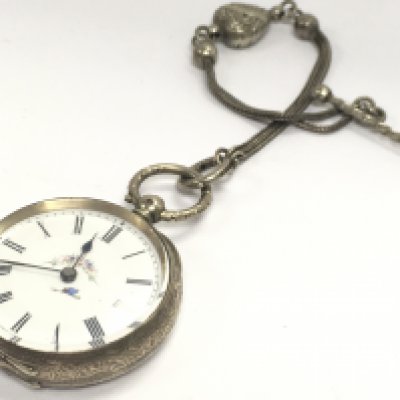 A silver pocket watch and silver albertina . This lot cannot be posted